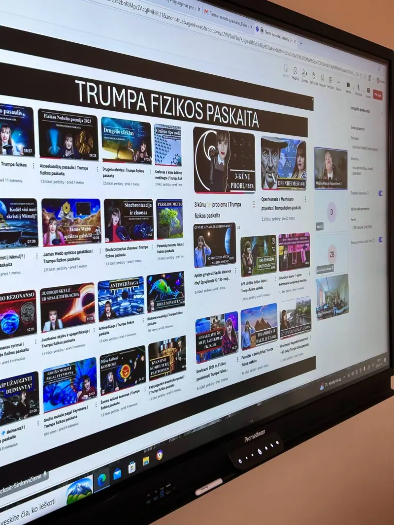 Klasės ekrane – „Trumpos fizikos paskaitos“ YouTube kanalo vaizdo įrašai, šone – susitikimo dalyviai