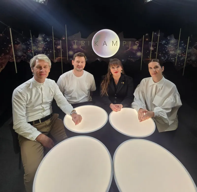 In the Trikampis studio at glowing tables: me with the show's hosts Jonas Dagys, Aivaras Vilutis and Goda Raibytė